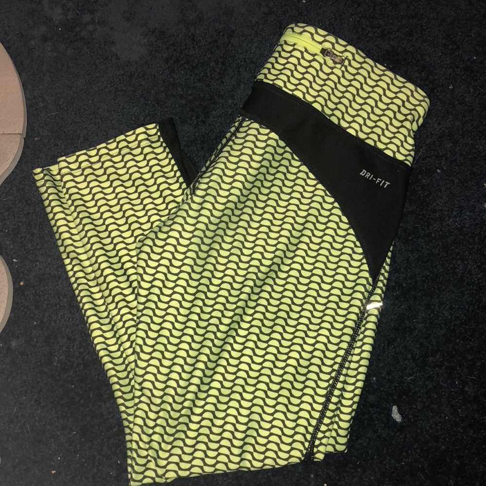 Bright yellow cropped Nike workout leggings